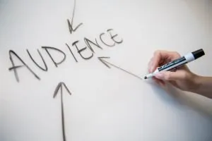 Person writing Audience as neglecting your customers is one of the Pitfalls to Avoid in SEO