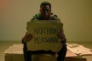 man holding a sign