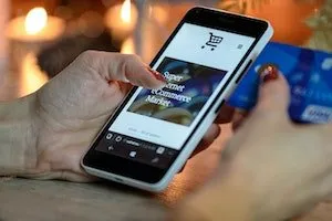 Ecommerce market written on the phone screen