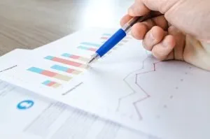 A person looking at data from using color psychology for better website conversion rates