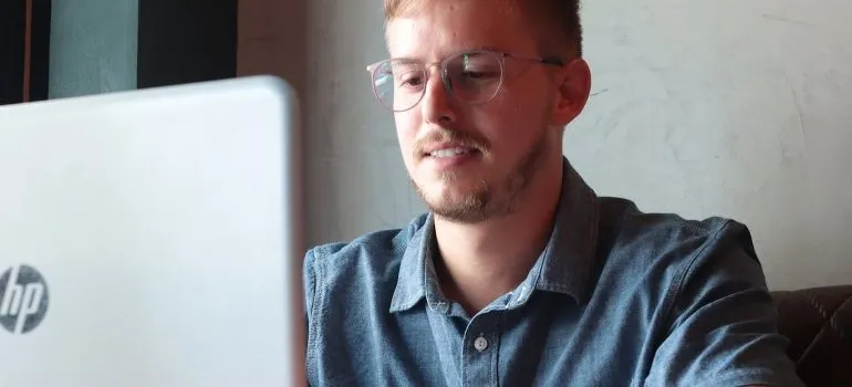 happy man using computer