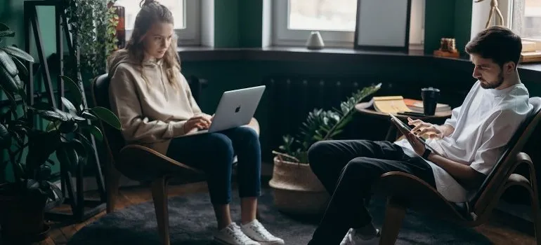 two people browsing internet