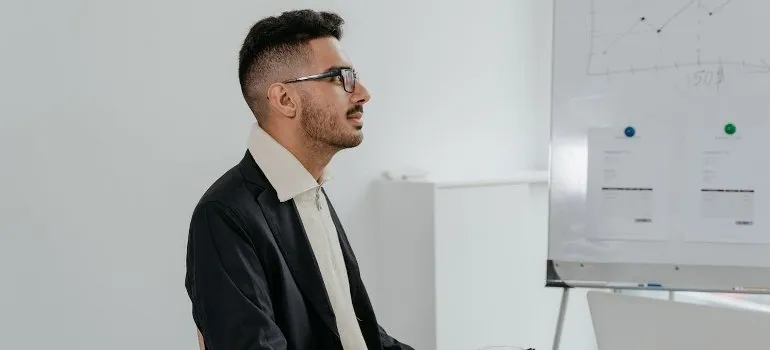 a man thinking about reducing risks in website migrations
