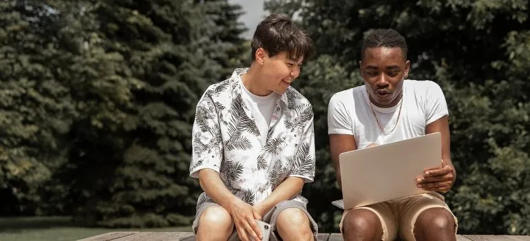 friends using laptop